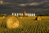 Oat straw rolls, grain elevator, near Yorkton